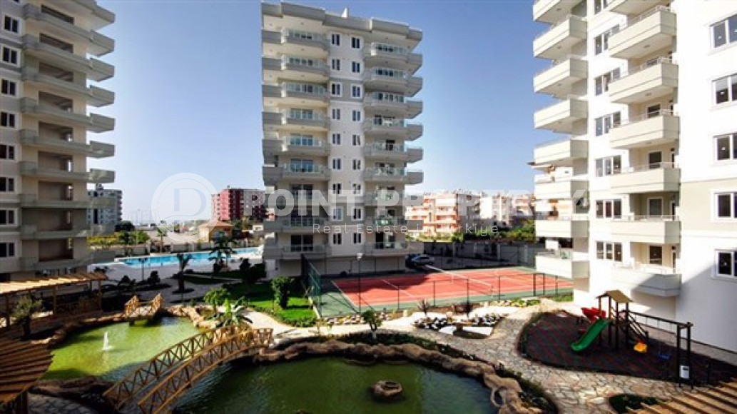 Three-room apartment, 125m², in the center of Tosmur, Alanya, in a complex with infrastructure-id-1520-photo-1
