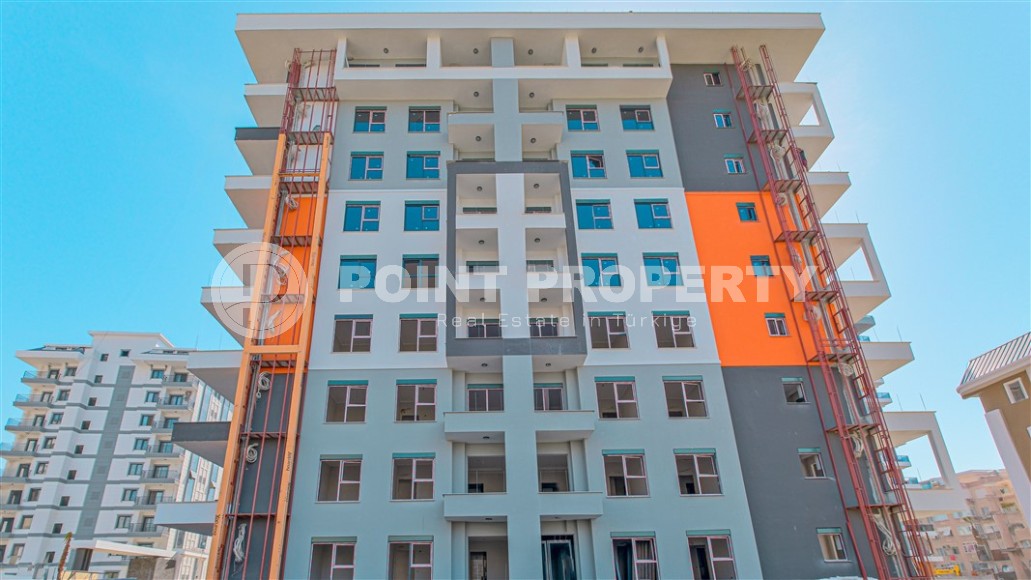Квартира в жилом комплексе на завершающем этапе строительства, в центре популярного района Аланьи - Махмутлар-id-6618-фото-1