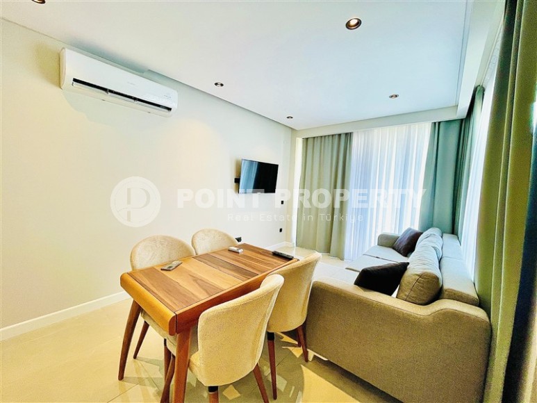 Stylish apartment with modern design, in a new residential complex, in the center of Alanya-id-6619-photo-1