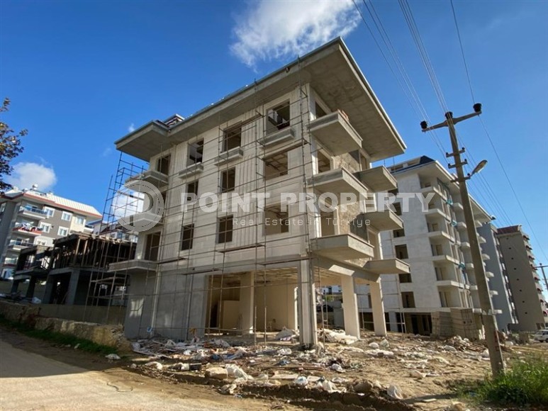 Apartment in a residential complex under construction, 1200 meters from the sea, in the Avsallar area-id-6635-photo-1