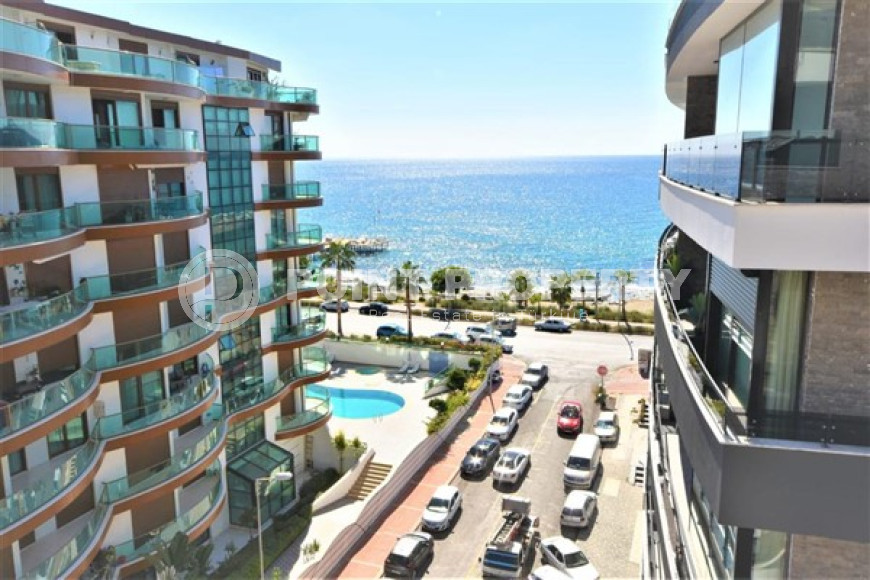 New three-room apartment, 85m², in an elite complex on the beach in Oba, Alanya-id-1531-photo-1