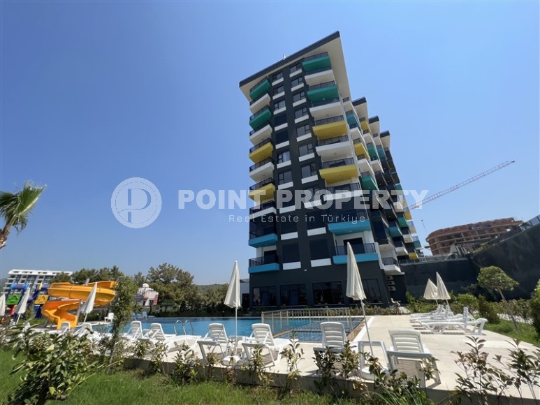 New apartment with fine finishing 1400 meters from the sea, in a quiet area of Alanya - Avsallar-id-6796-photo-1