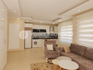 Bright, comfortable apartment with modern design, 500 meters from the sea, in the center of Mahmutlar-id-6831-photo-1