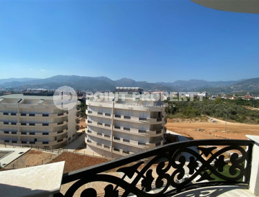 New view three-room apartment, 85m² at the foot of the mountains in Upper Oba, Alanya-id-1535-photo-1