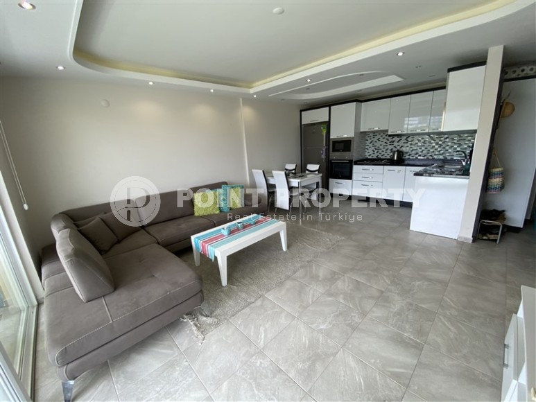 Ready-to-move-in apartment 1+1, with a total area of 65 m2, in the picturesque area of Alanya - Kestel-id-6841-photo-1