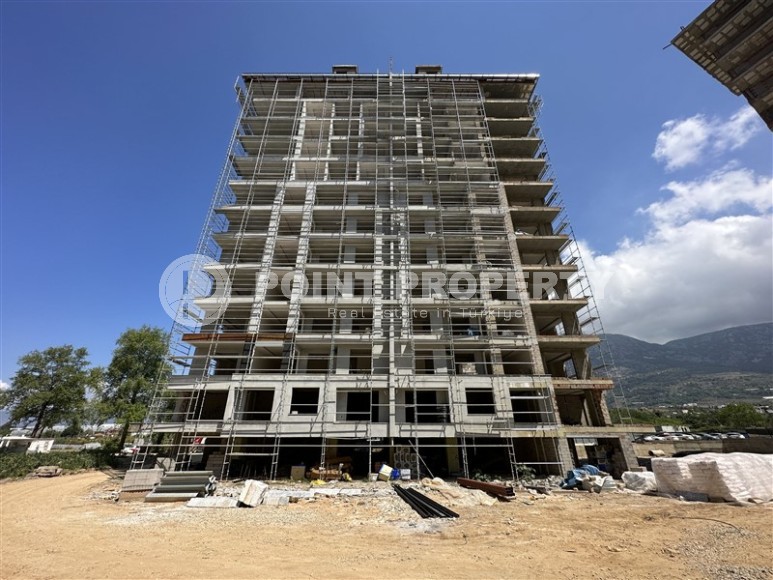 Small apartment in a residential complex at the final stage of construction, in the modern area of Alanya - Mahmutlar-id-6853-photo-1