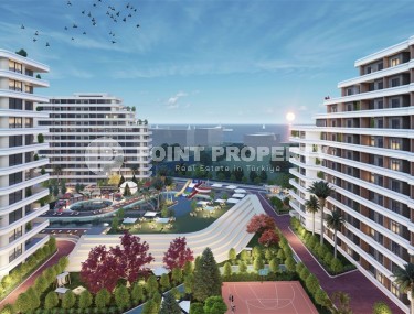 Новый грандиозный проект премиум класса у моря с большими квартирами от 70 до 180 м2 в Томюке, Мерсин. Супер цена!-id-1426-фото-1