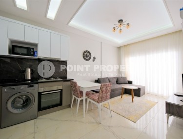 New 1+1 apartment with furniture and household appliances, on the 1st floor in a residential complex, commissioned in 2022-id-6939-photo-1