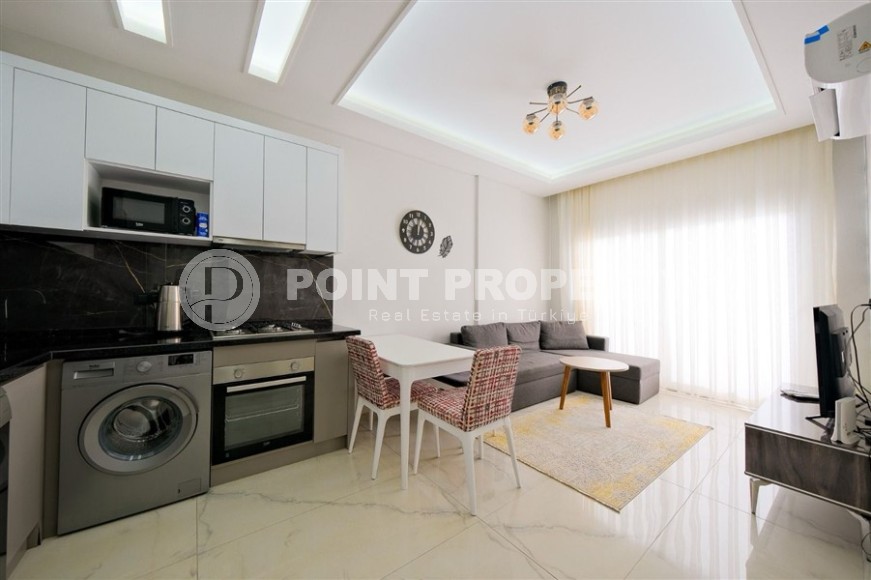 New 1+1 apartment with furniture and household appliances, on the 1st floor in a residential complex, commissioned in 2022-id-6939-photo-1