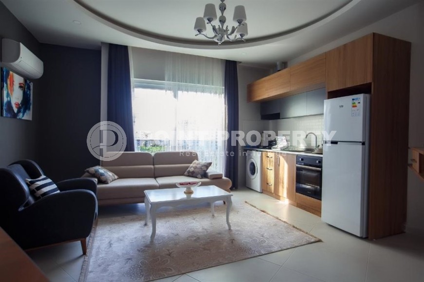Modern apartment with furniture and household appliances, 500 meters from the sea, in the center of Mahmutlar-id-6952-photo-1