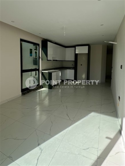 New apartment with fine finishing 150 meters from the sea, in the center of Alanya-id-7054-photo-1