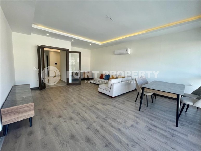 Comfortable modern apartment with two bedrooms and a separate kitchen, 100 meters from the luxurious sandy beach-id-7080-photo-1