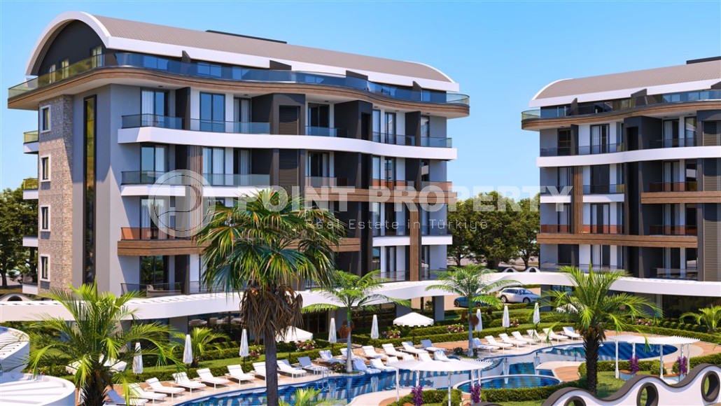 Compact 1+1 apartment in a premium residence under construction, three kilometers from the sea-id-7142-photo-1