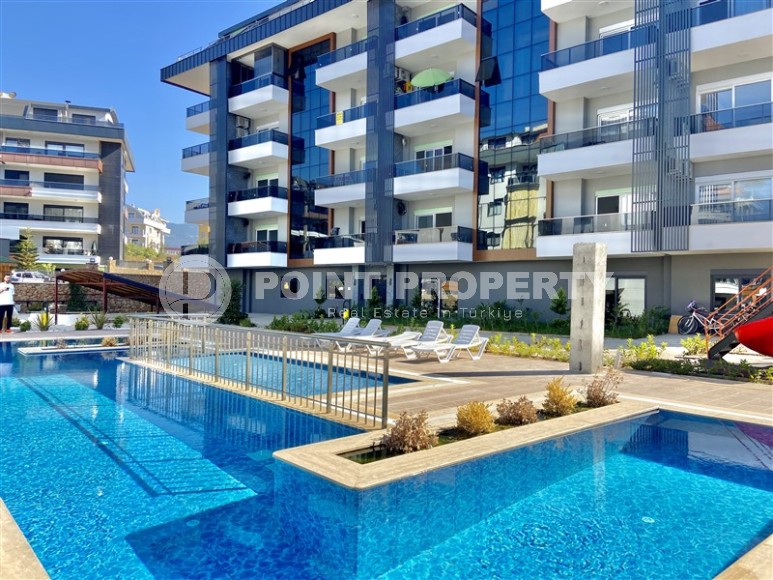 New apartment with high-quality finishing one and a half kilometers from the sea, in the modern area of Alanya - Upper Oba-id-7160-photo-1