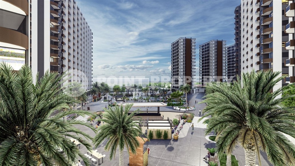Новый инвестиционно привлекательный проект в курортном районе Мерсина - Тарсус - масштабный жилой комплекс, состоящий из семи 15-этажных блоков, в десяти километрах от моря-id-7251-фото-1