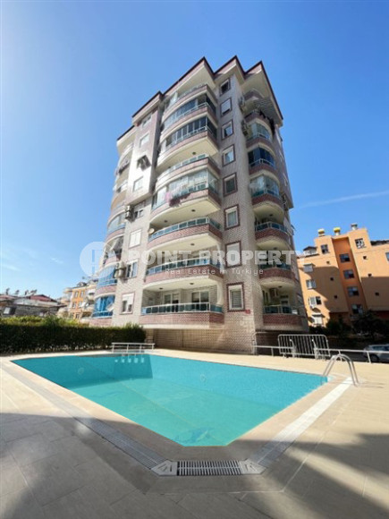 Furnished three-room apartment, 130m², in a cozy complex with a swimming pool, in the center of Alanya-id-1561-photo-1