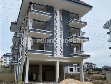 Недорогая квартира в резиденции на этапе строительства, в перспективном районе Аланьи - Авсаллар-id-7270-фото-1