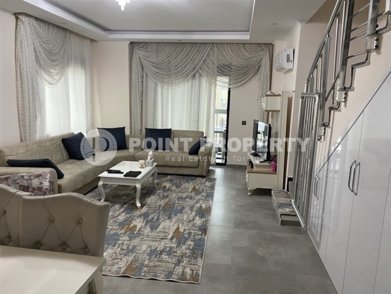 Large duplex apartment with city and mountain views, on the 4th floor with attic in the center of Alanya-id-7331-photo-1