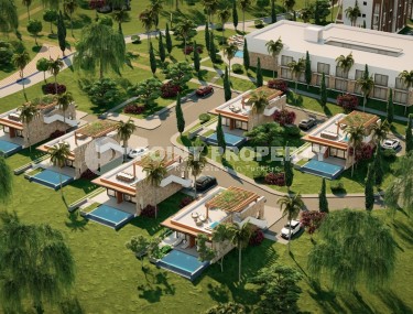 Новый инвестиционный проект - элитный жилой комплекс на первой линии от моря, в курортном поселке Северного Кипра - Татлысу-id-7365-фото-1
