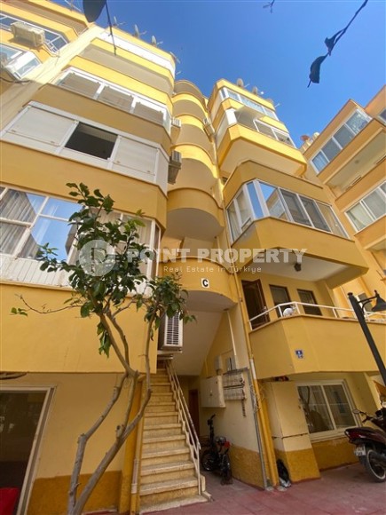 Inexpensive apartment 150 meters from the sea, on the main street of the Mahmutlar district-id-7394-photo-1