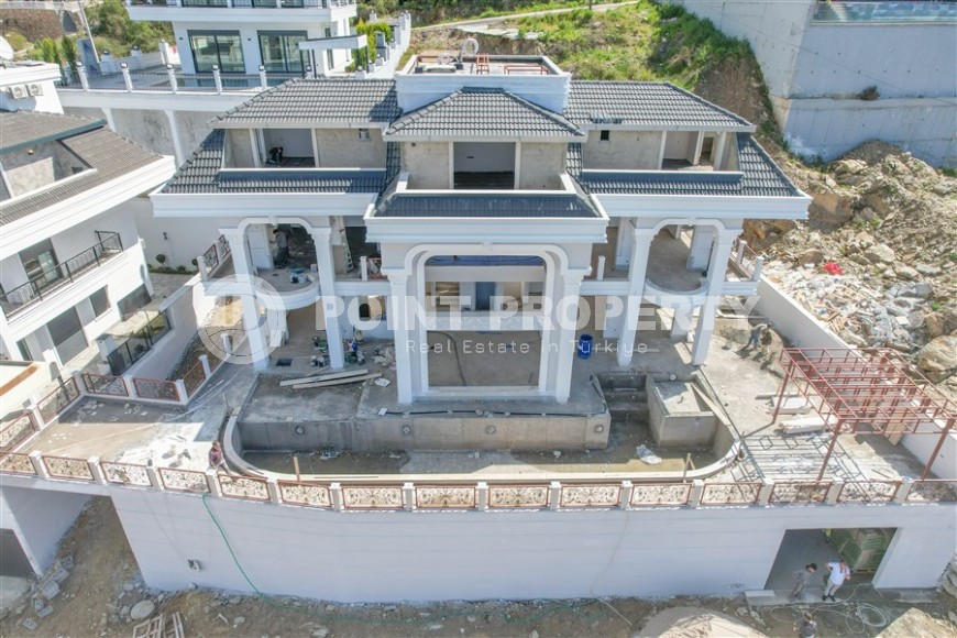 Luxury duplex villa with a total living area of 492 m2 under construction, Kargicak area-id-4164-photo-1