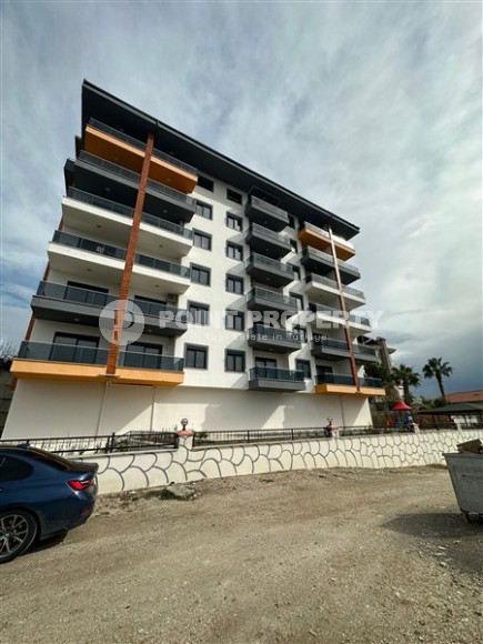Новая квартира с чистовой отделкой в 750 метрах от моря, в спокойном районе Аланьи - Демирташ-id-7401-фото-1