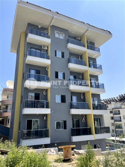 Two-room apartment at a reasonable price in a low-rise complex under construction, Avsallar district-id-4302-photo-1