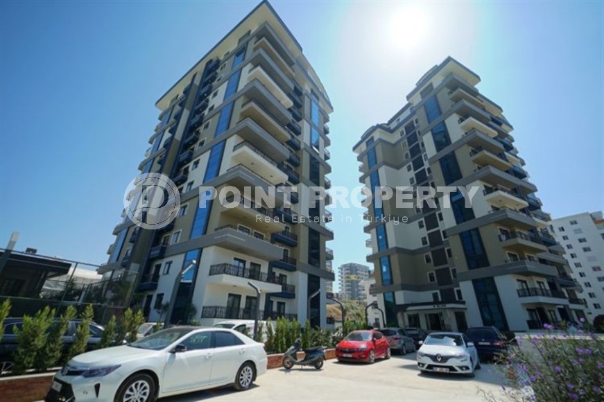 Панорамная квартира 1+1 с видом на город, на 8-м этаже в центре района Махмутлар-id-7506-фото-1