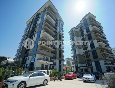 Новая квартира  в роскошном жилом комплексе с инфраструктурой «город в городе», в центре современного района Аланьи - Махмутлар-id-7516-фото-1