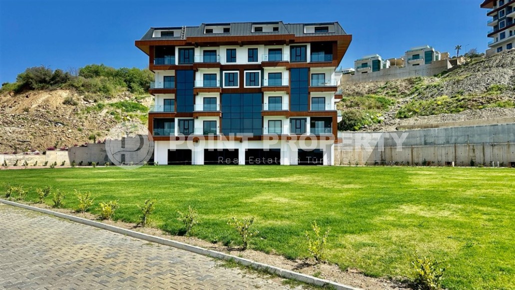 New apartment with fine finishing one and a half kilometers from the sea, in a prestigious area of Alanya - Kargicak-id-7531-photo-1