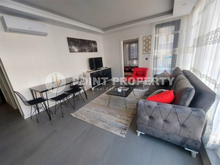 Small modern apartment on the 3rd floor in a building built in 2022, in the center of Alanya-id-7566-photo-1