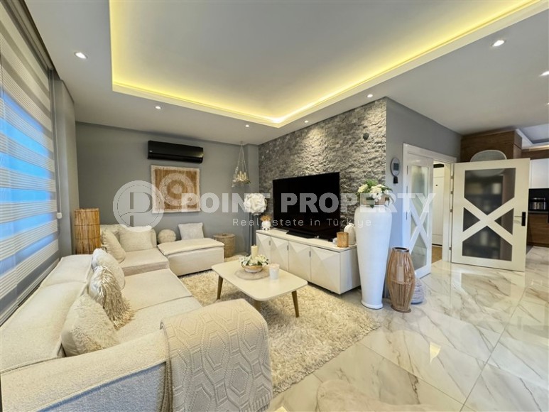 Stylish two-level apartment with a private pool and garden, in the European region of Alanya - Lower Oba-id-7583-photo-1