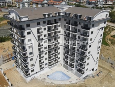 Компактная квартира на 7-м этаже в жилом комплексе на завершающем этапе строительства, в спокойном районе Аланьи - Паяллар-id-7625-фото-12