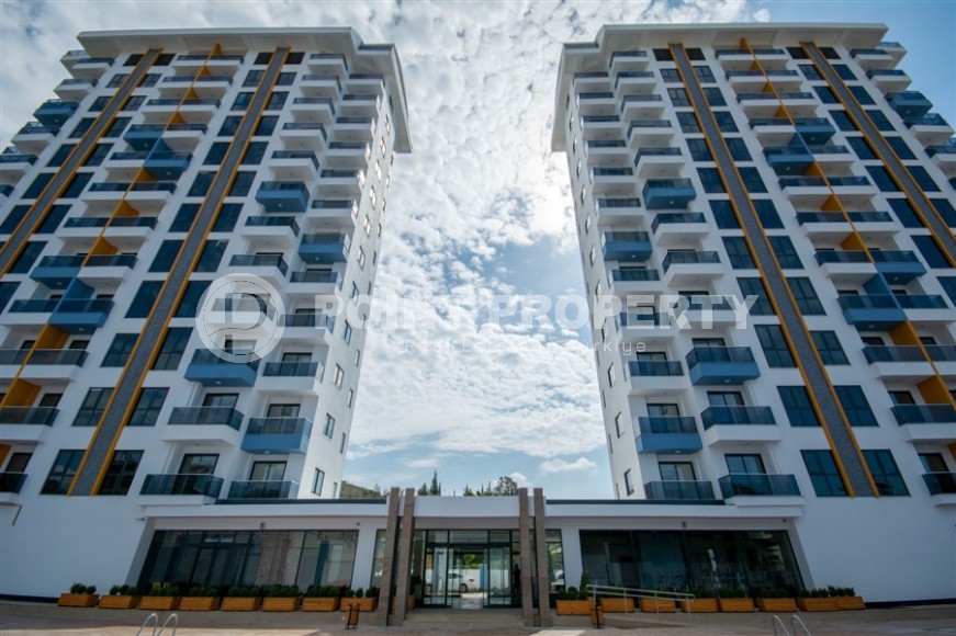 Компактная новая квартира с качественной чистовой отделкой в 1800 метрах от моря, в районе Махмутлар-id-7630-фото-1
