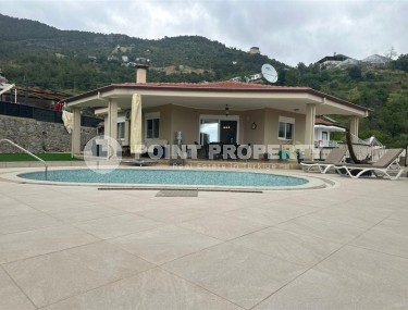 Detached villa with a swimming pool and garden area, four and a half kilometers from the sea-id-7633-photo-1