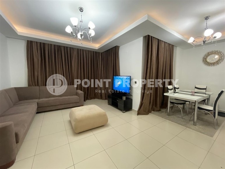 Ready-to-move-in apartment 2+1 450 meters from the sea, in the center of the Tosmur district-id-7642-photo-1