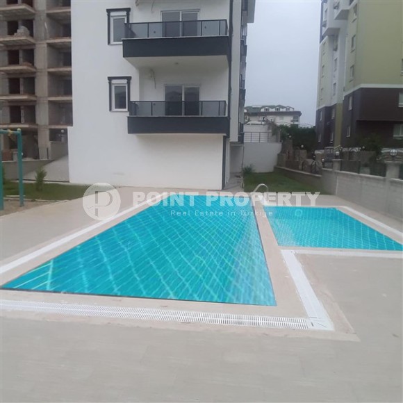 Inexpensive apartment 2+1, with a total area of 80 m2, in a promising area of Alanya - Avsallar-id-7700-photo-1