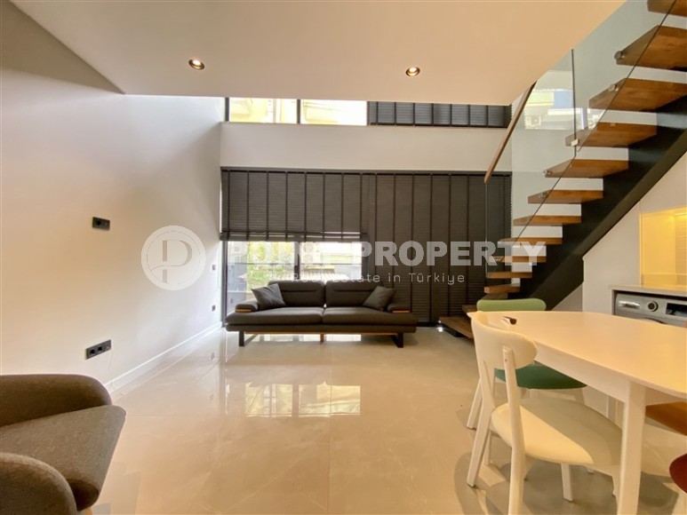 Atmospheric 1+1 loft with a minimalist design, 150 meters from Cleopatra Beach-id-7742-photo-1