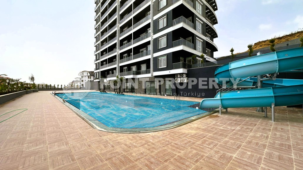 Compact 1+1 apartment, with a total area of 55 m2, in a promising area of Alanya - Avsallar-id-7748-photo-1