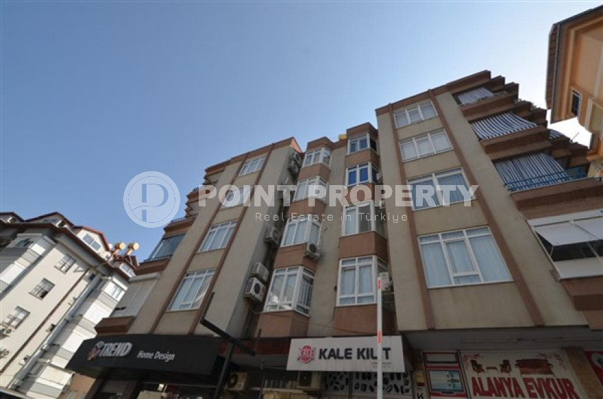 Three-room apartment, 115 m², with a separate kitchen in an urban house in the center of Alanya-id-1599-photo-1