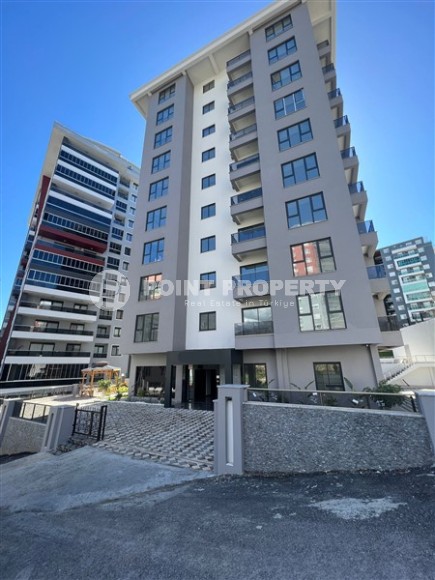 Новая квартира 2+1, общей площадью 75 м2, в современном районе Аланьи - Махмутлар-id-7753-photo-1