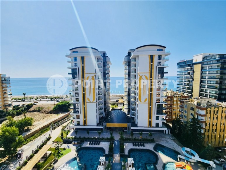 New 1+1 apartment with panoramic sea views, in the center of the modern area of Alanya - Mahmutlar-id-7903-photo-1