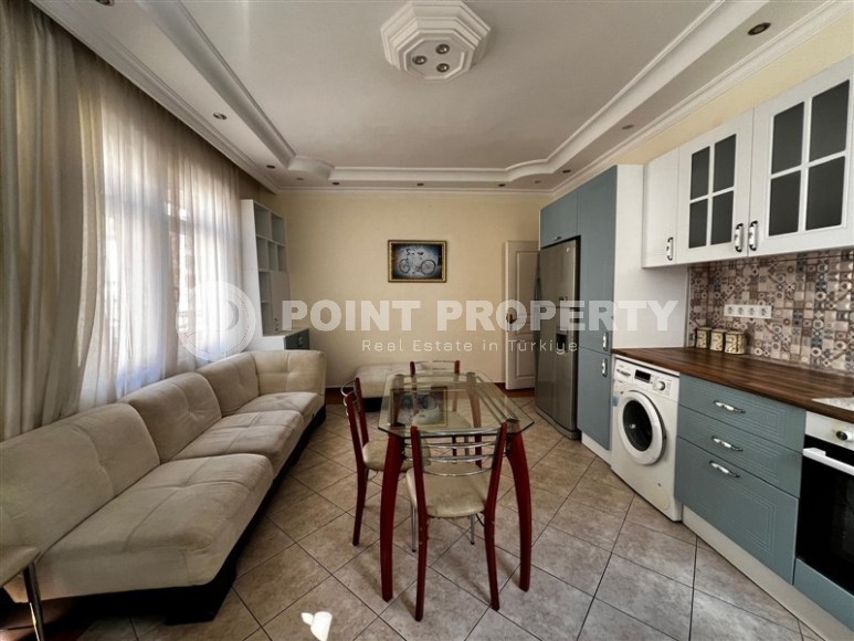 Advantageous offer - inexpensive 3+1 apartment, with a total area of 125 m2, in the center of Mahmutlar district-id-7975-photo-1