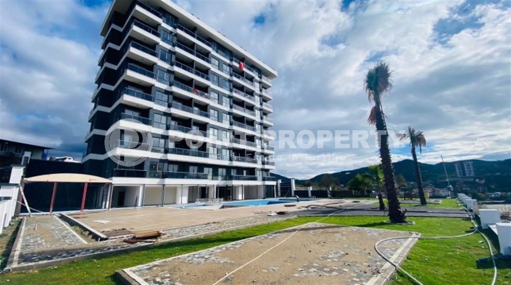 Inexpensive 1+1 apartment, with a total area of 55 m2, in the picturesque area of Alanya - Demirtas-id-7983-photo-1