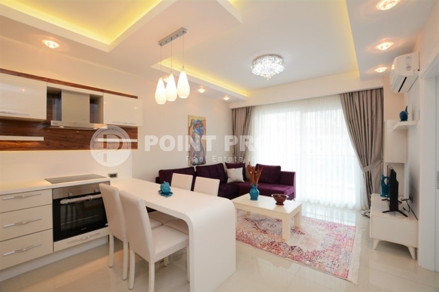 Modern, comfortable 1+1 apartment 250 meters from the beach, in the center of Mahmutlar-id-7986-photo-1