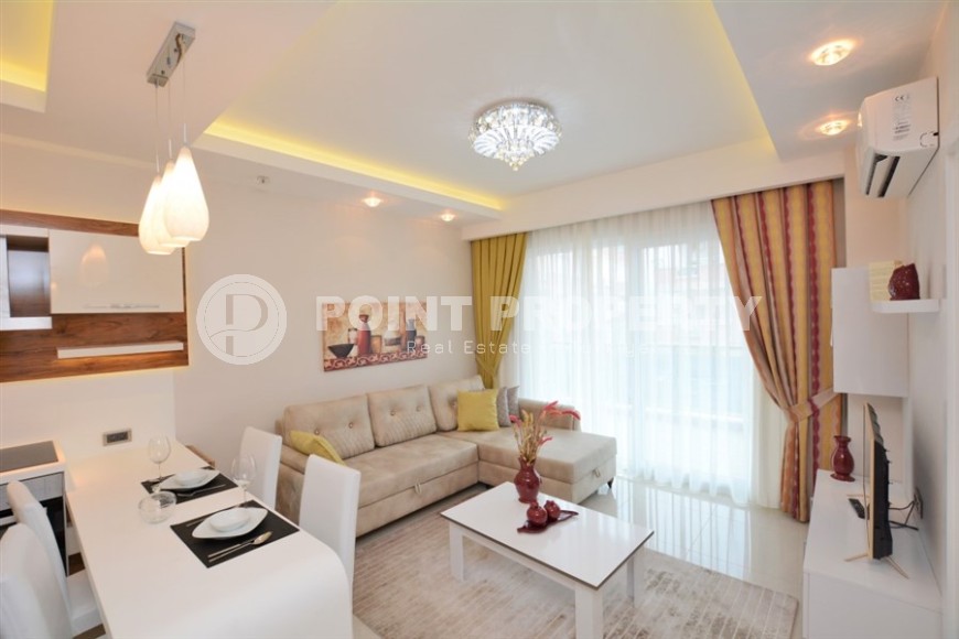 Comfortable apartment with modern design 250 meters from the sea, in the center of Mahmutlar-id-8005-photo-1