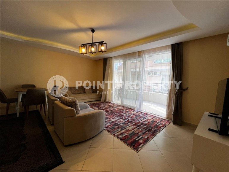 Comfortable 1+1 apartment 150 meters from the sea, in the center of the popular resort area - Nizhnyaya Oba-id-8015-photo-1