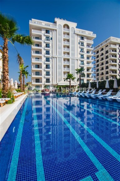 Modern 2+1 apartment on the 1st floor in an elite residential complex in the center of Alanya-id-8029-photo-1