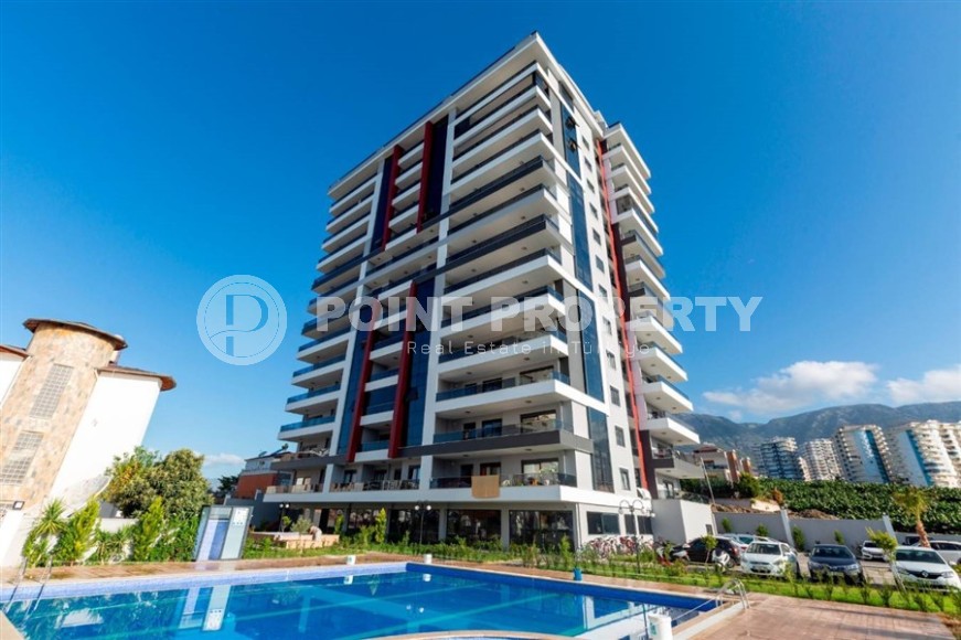 Stylish 2+1 apartment in the center of the popular Mahmutlar area on the 5th floor-id-8058-photo-1