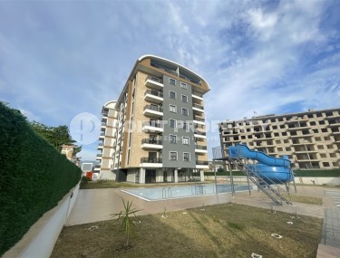 Новые квартиры 1+1 с чистовой отделкой в зеленом, экологически чистом районе Аланьи - Газипаша-id-8070-фото-1